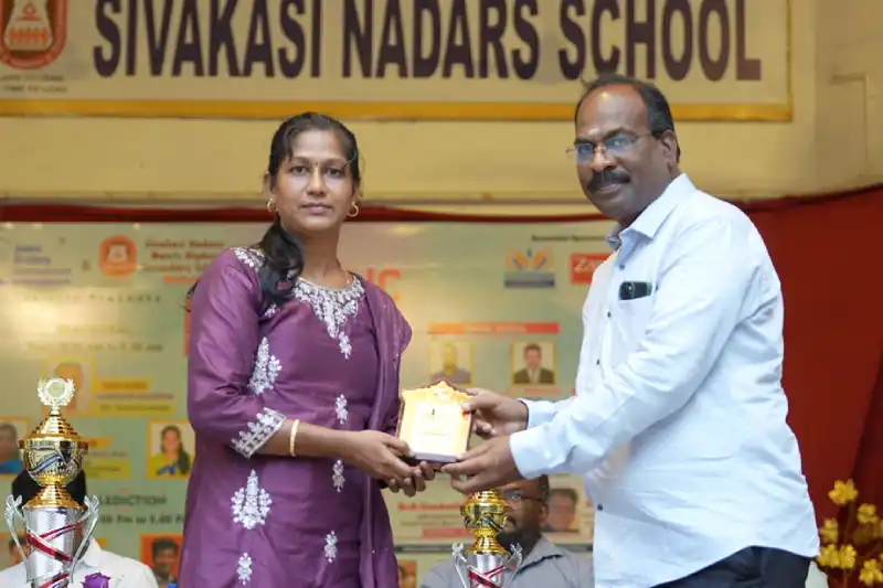 Award presentation at a training program in Madurai